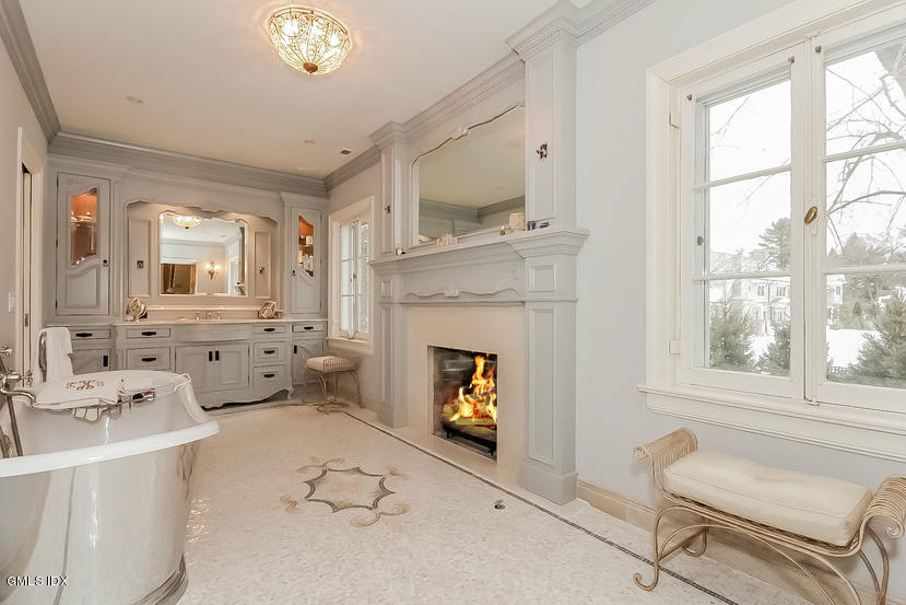 200 Stanwich Road Greenwich, CT 06830 - Photo 15 of 18 a living room with furniture and a fireplace