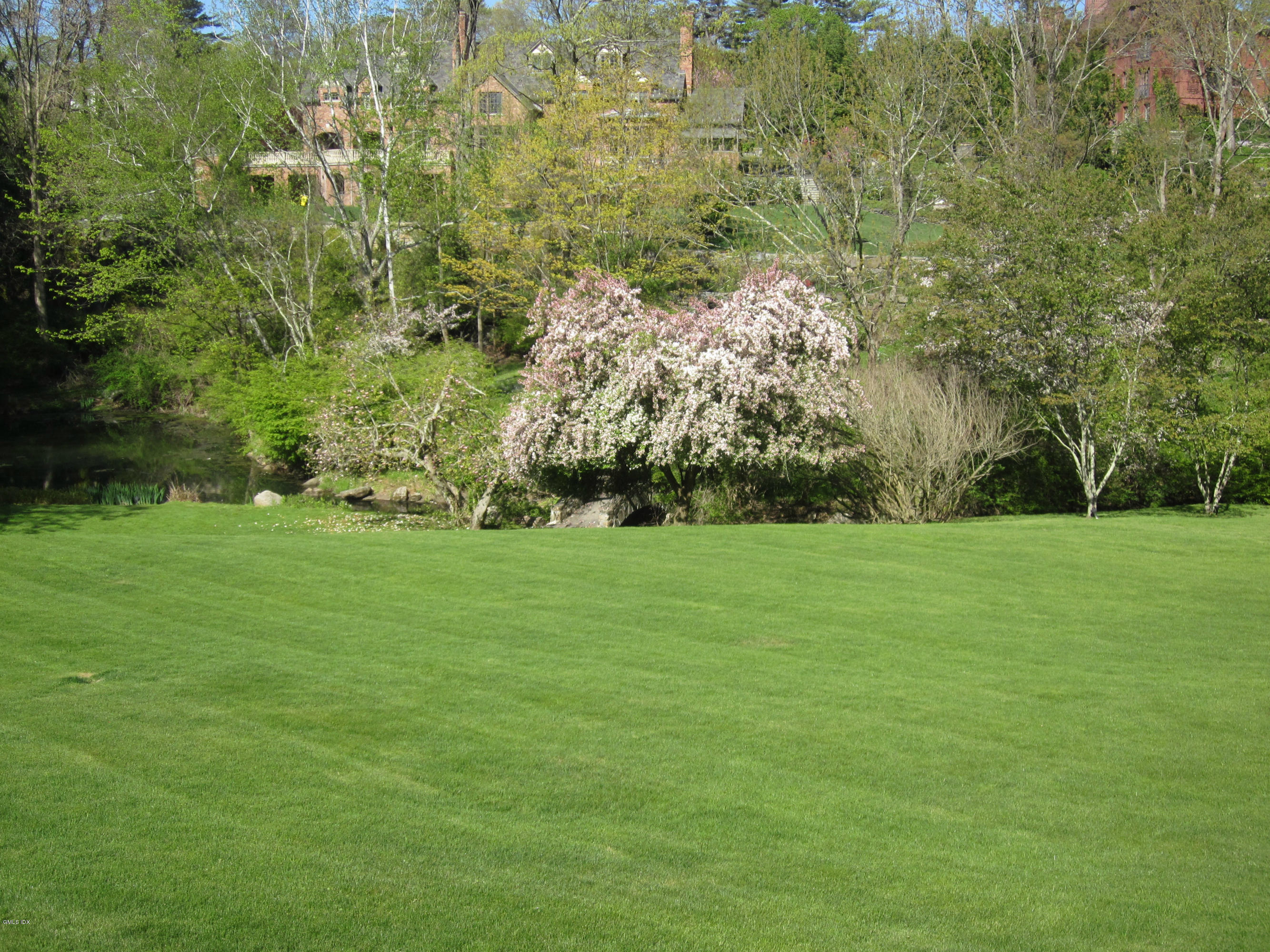200 Stanwich Road Greenwich, CT 06830 - Photo 16 of 18 a view of a field with trees