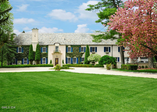 200 Stanwich Road Greenwich, CT 06830 - Photo 2 of 18 a front view of house with yard and green space