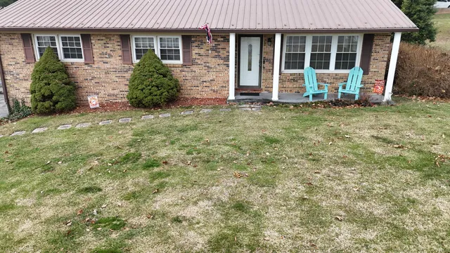 front view of a house with a yard