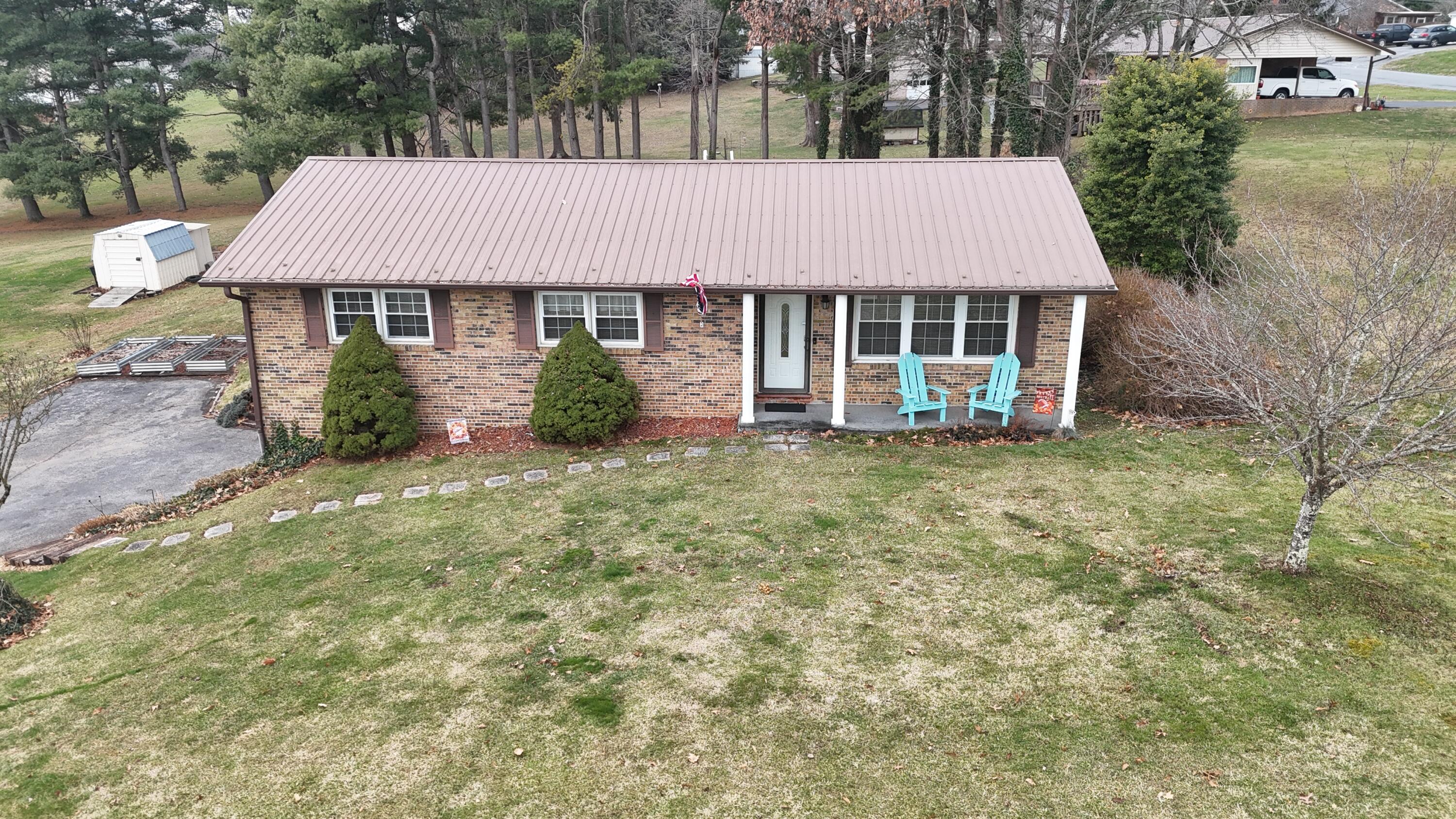 448 Baughman Avenue Marion, VA 24354 - Photo 2 of 43 aerial view of a house with yard and sitting area