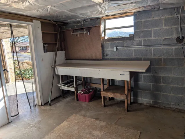 a water heater on the side of a room