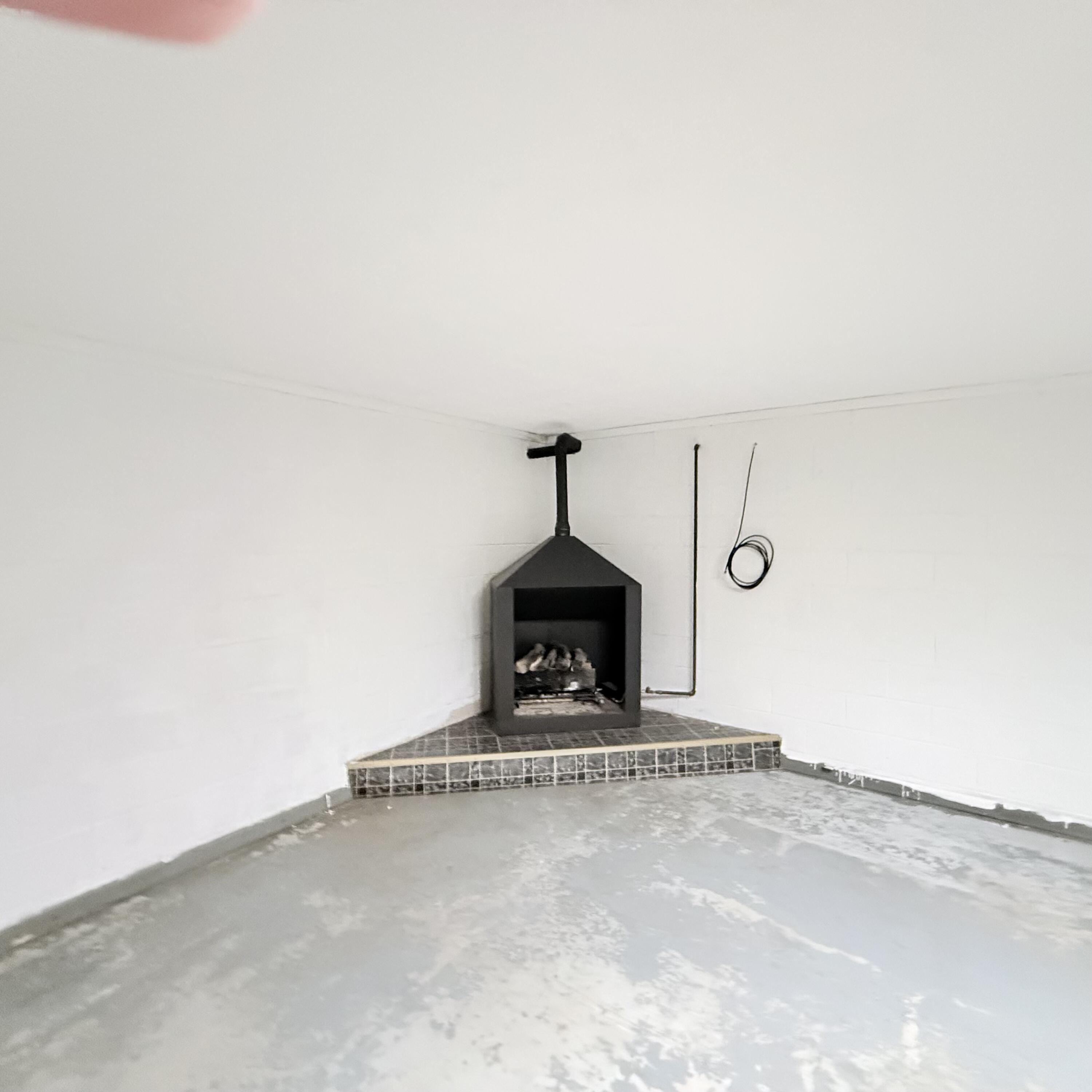 448 Baughman Avenue Marion, VA 24354 - Photo 37 of 43 a water heater on the side of a room