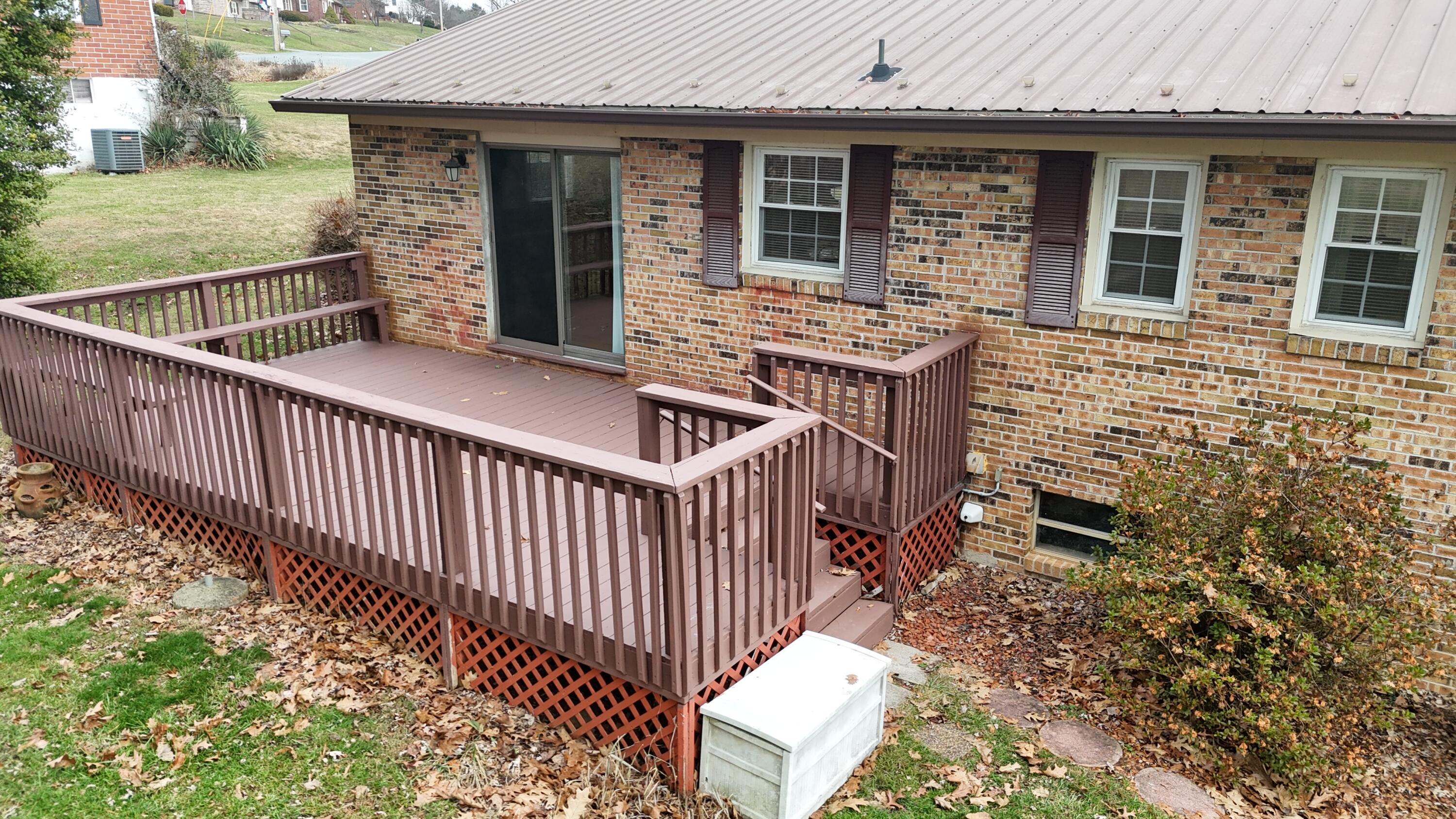 448 Baughman Avenue Marion, VA 24354 - Photo 10 of 43 a view of a house with backyard and porch
