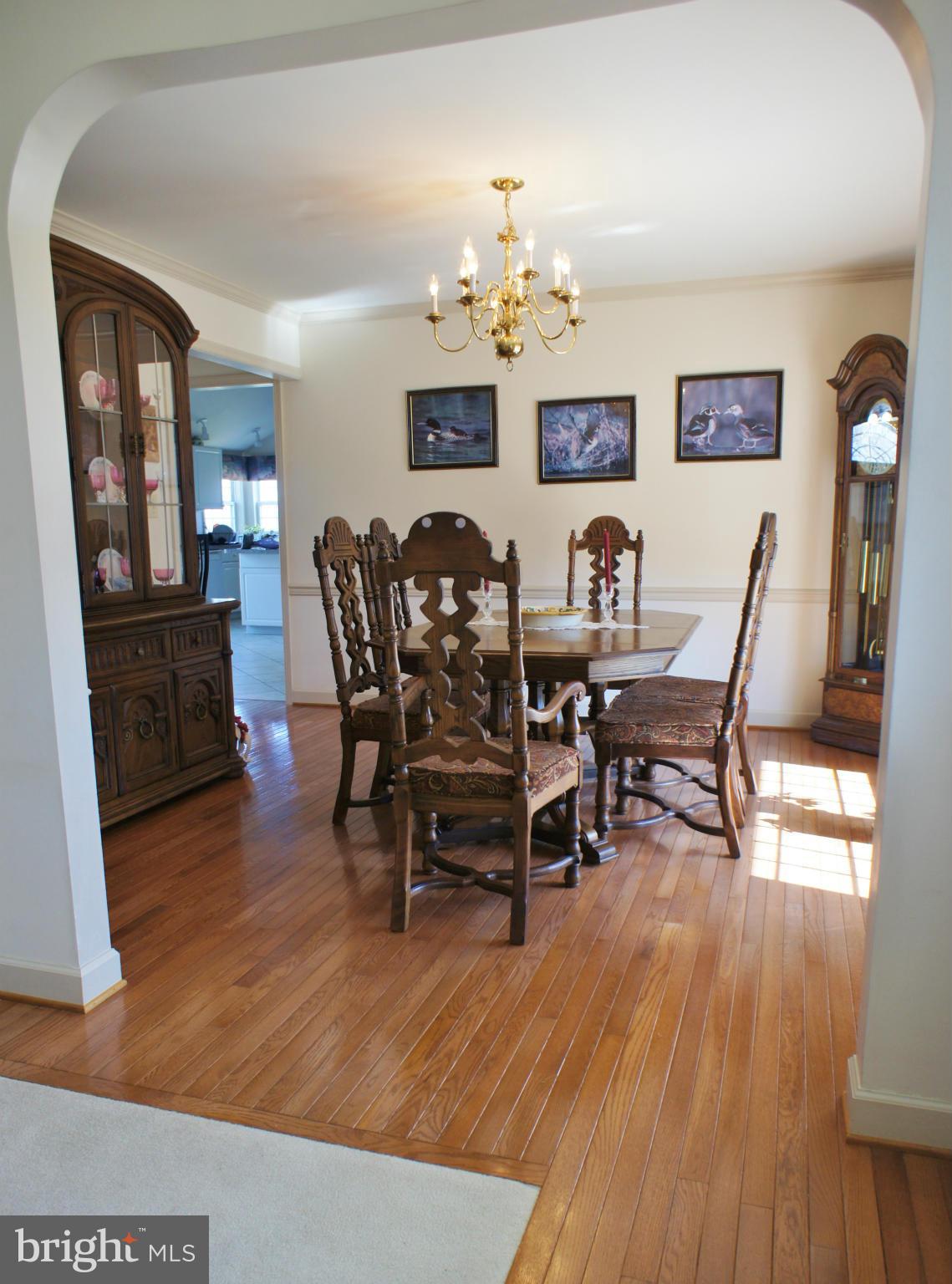5971 Ketch Road Prince Frederick, MD 20678 - Photo 13 of 30 a view of a dining room with furniture and wooden floor
