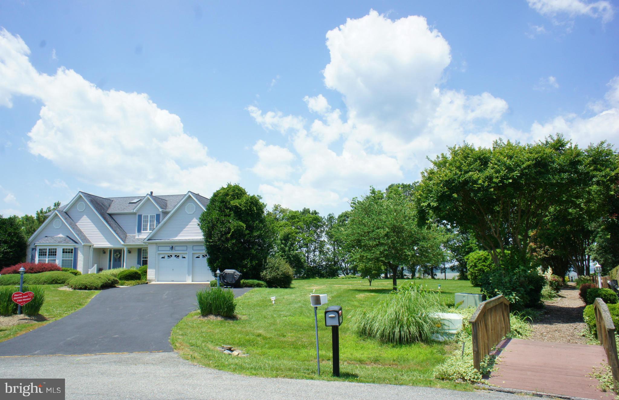 5971 Ketch Road Prince Frederick, MD 20678 - Photo 24 of 30 a view of house with garden space and street view