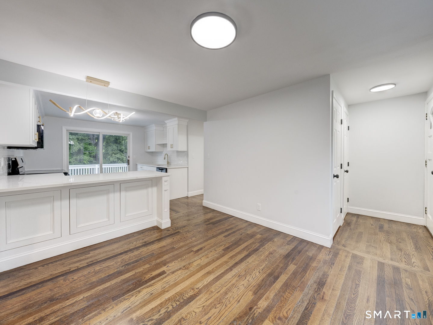 11 Cheshire Road Prospect, CT 06712 - Photo 6 of 38 a view of kitchen with wooden floor and window