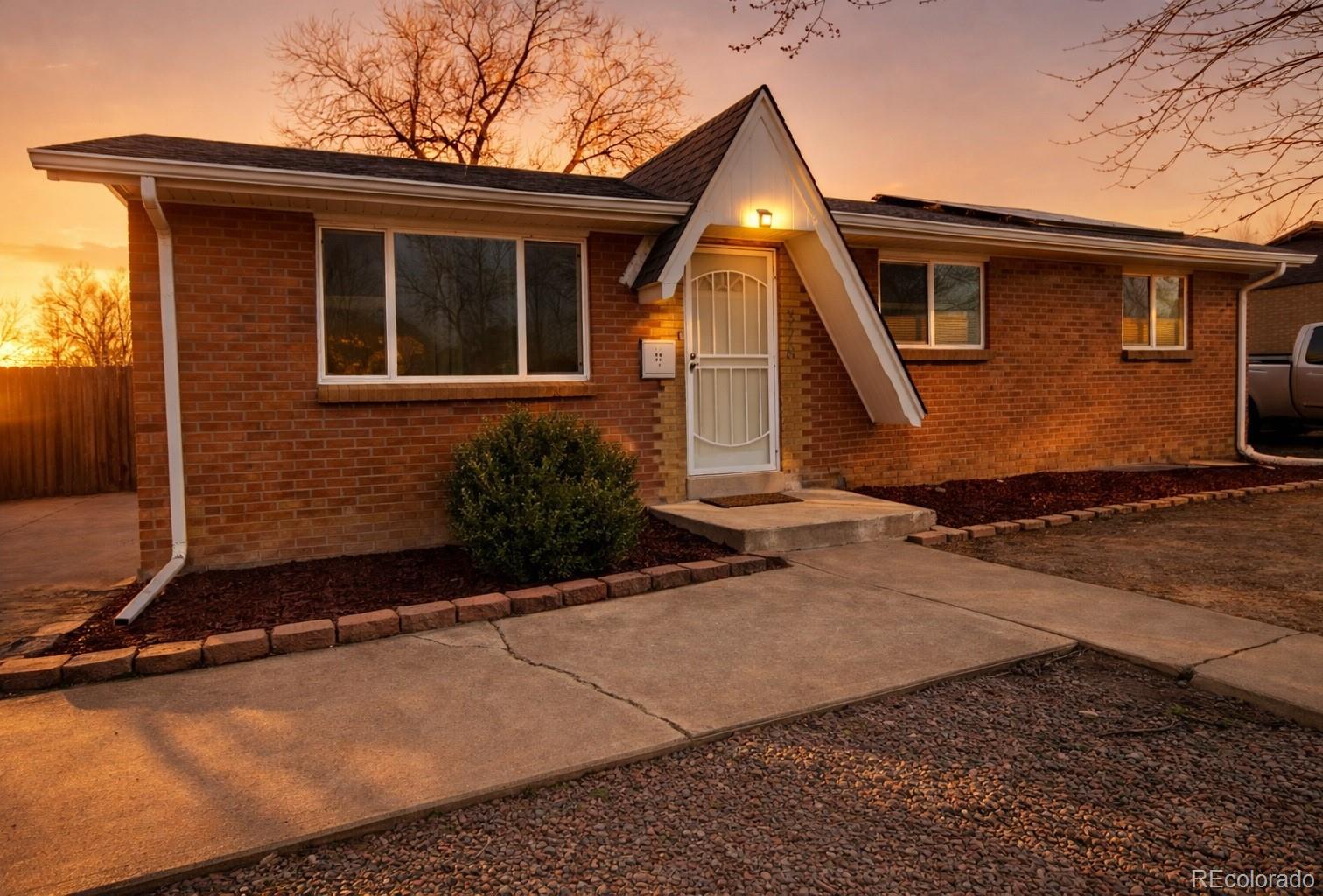 378 South Racine Street Aurora, CO 80012 - Photo 1 of 44 a view of backyard of house