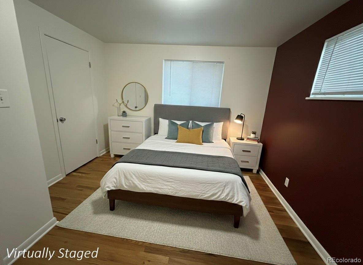 378 South Racine Street Aurora, CO 80012 - Photo 11 of 44 a bed room with a bed and a window