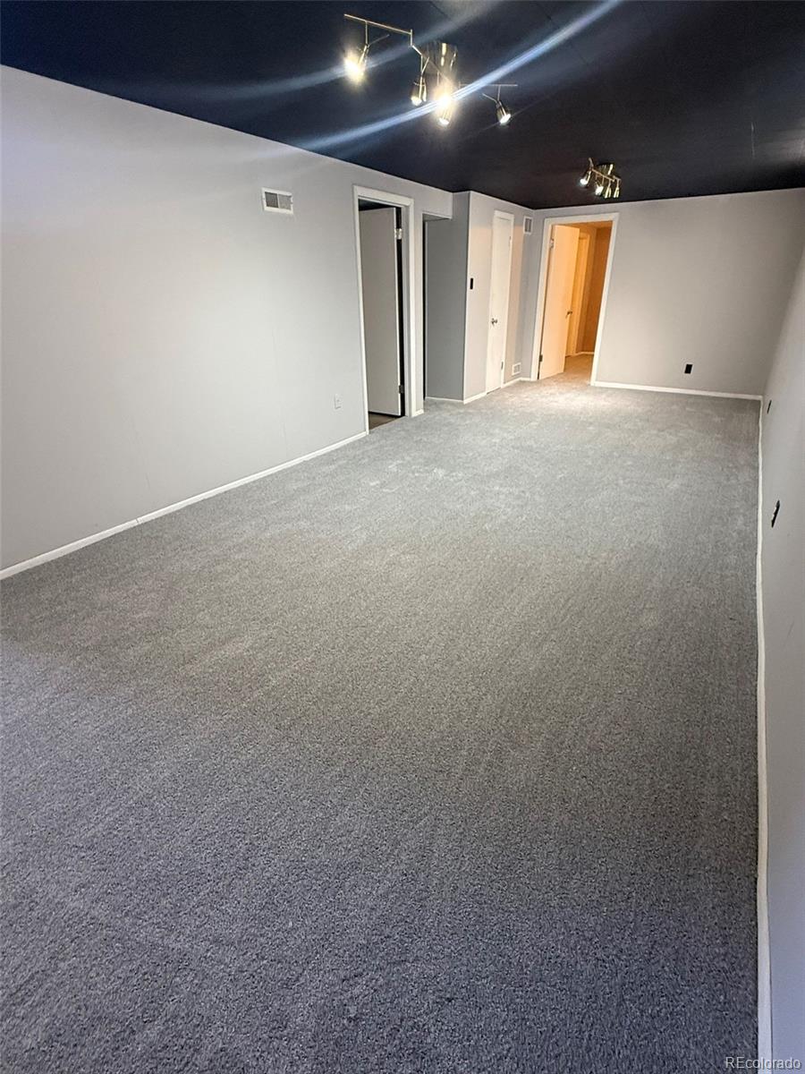 378 South Racine Street Aurora, CO 80012 - Photo 19 of 44 a view of an empty room