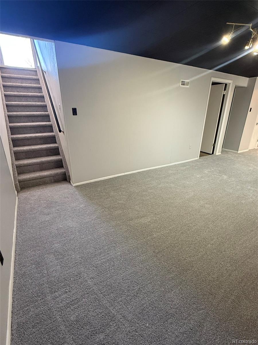 378 South Racine Street Aurora, CO 80012 - Photo 20 of 44 a view of an empty room