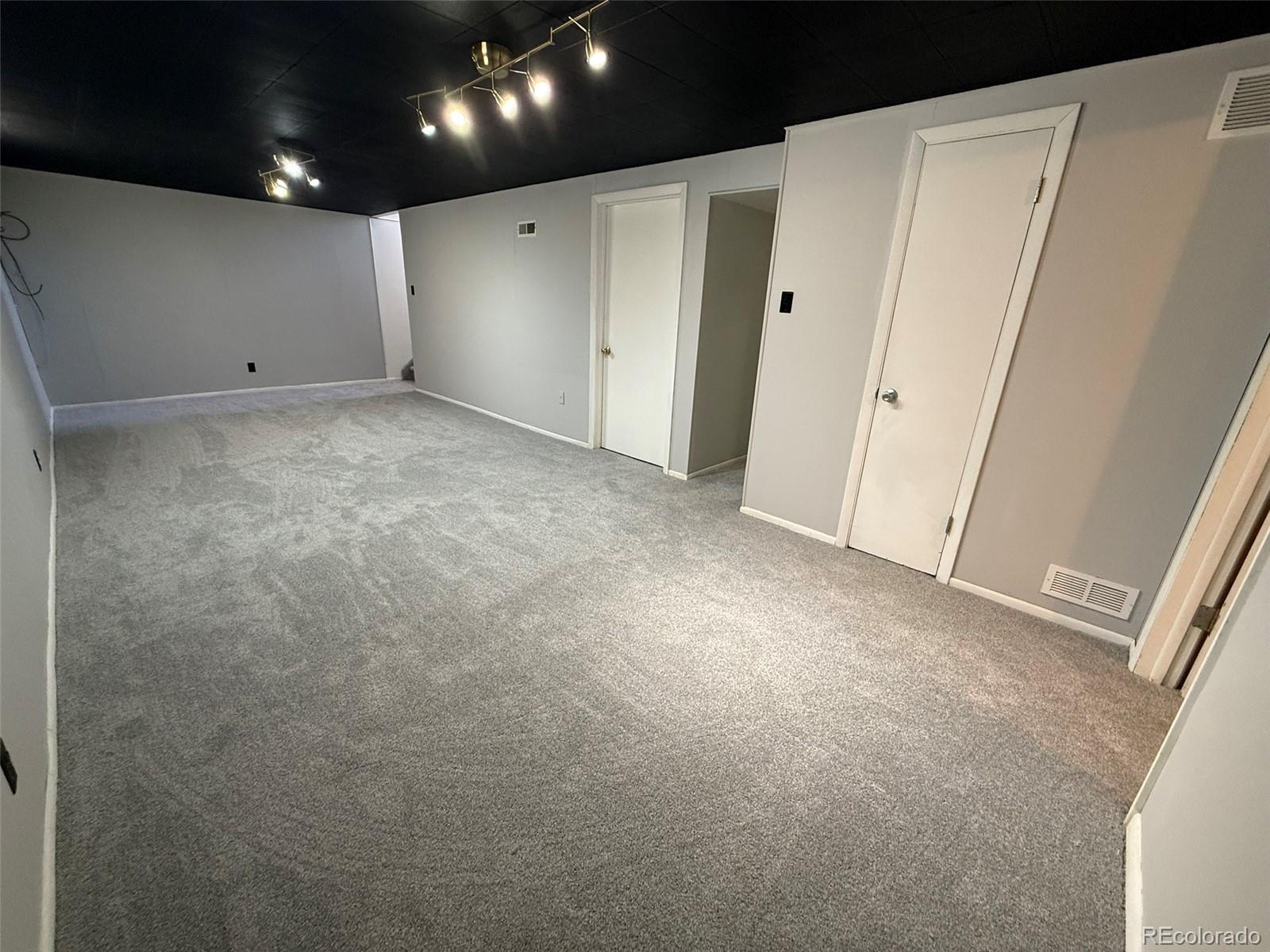 378 South Racine Street Aurora, CO 80012 - Photo 22 of 44 a view of an empty room