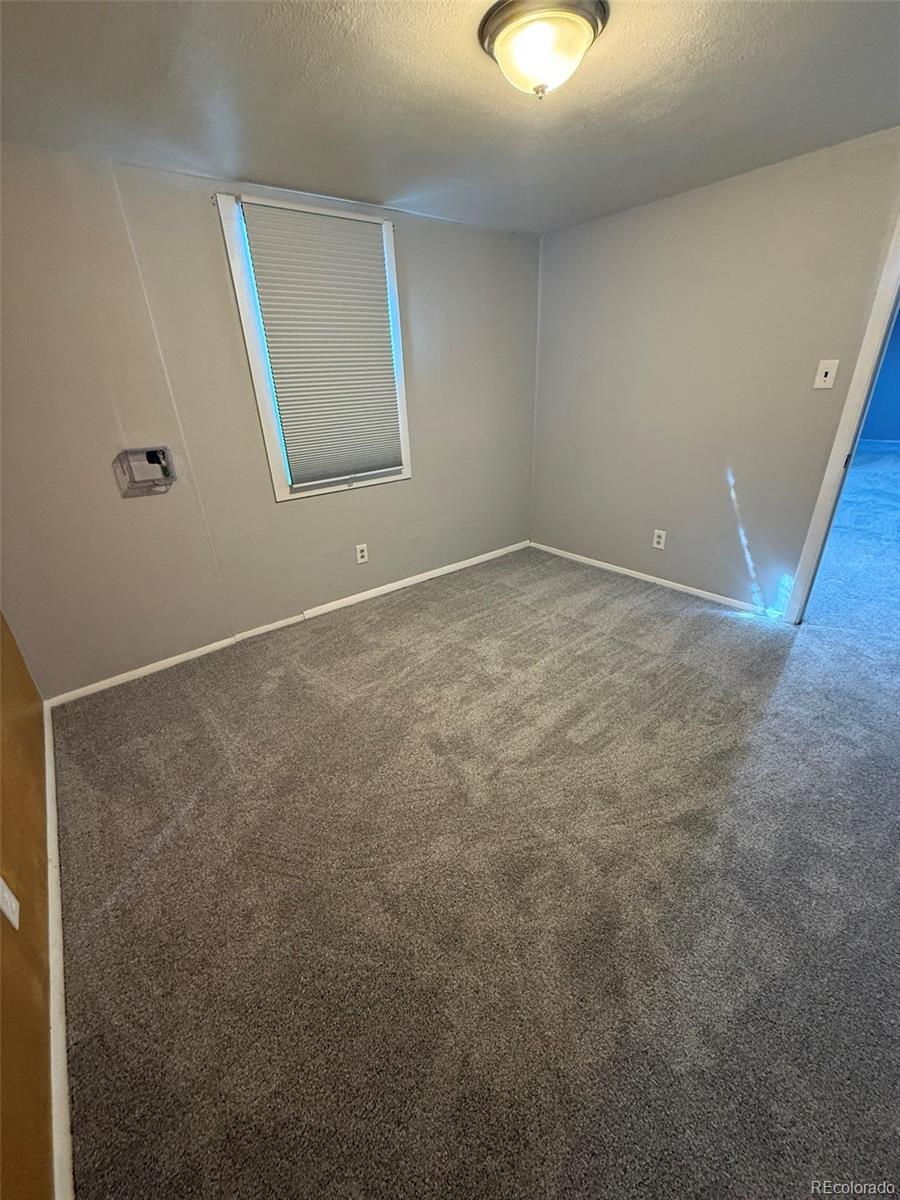 378 South Racine Street Aurora, CO 80012 - Photo 26 of 44 a view of an empty room