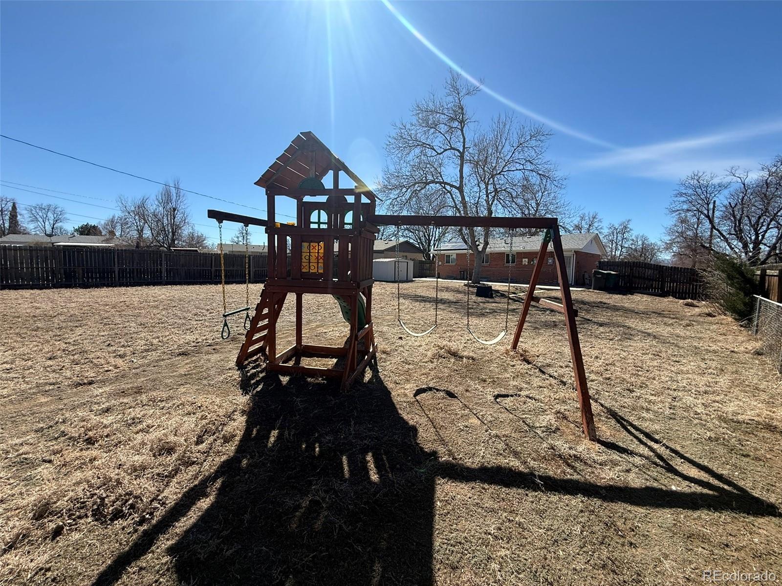 378 South Racine Street Aurora, CO 80012 - Photo 38 of 44 a view of a balcony with chairs