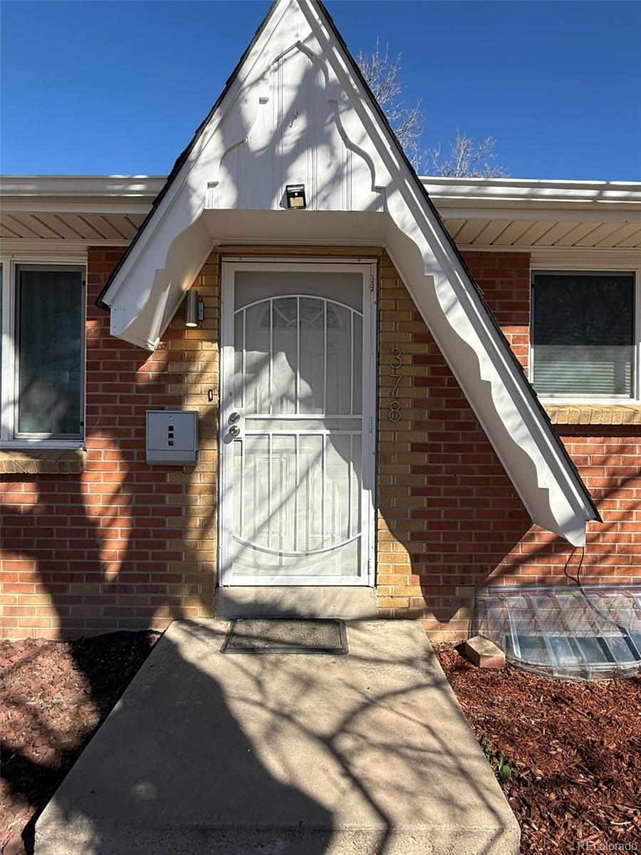 378 South Racine Street Aurora, CO 80012 - Photo 44 of 44 a view of front door of house