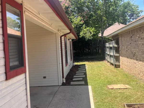 a view of swimming pool with patio