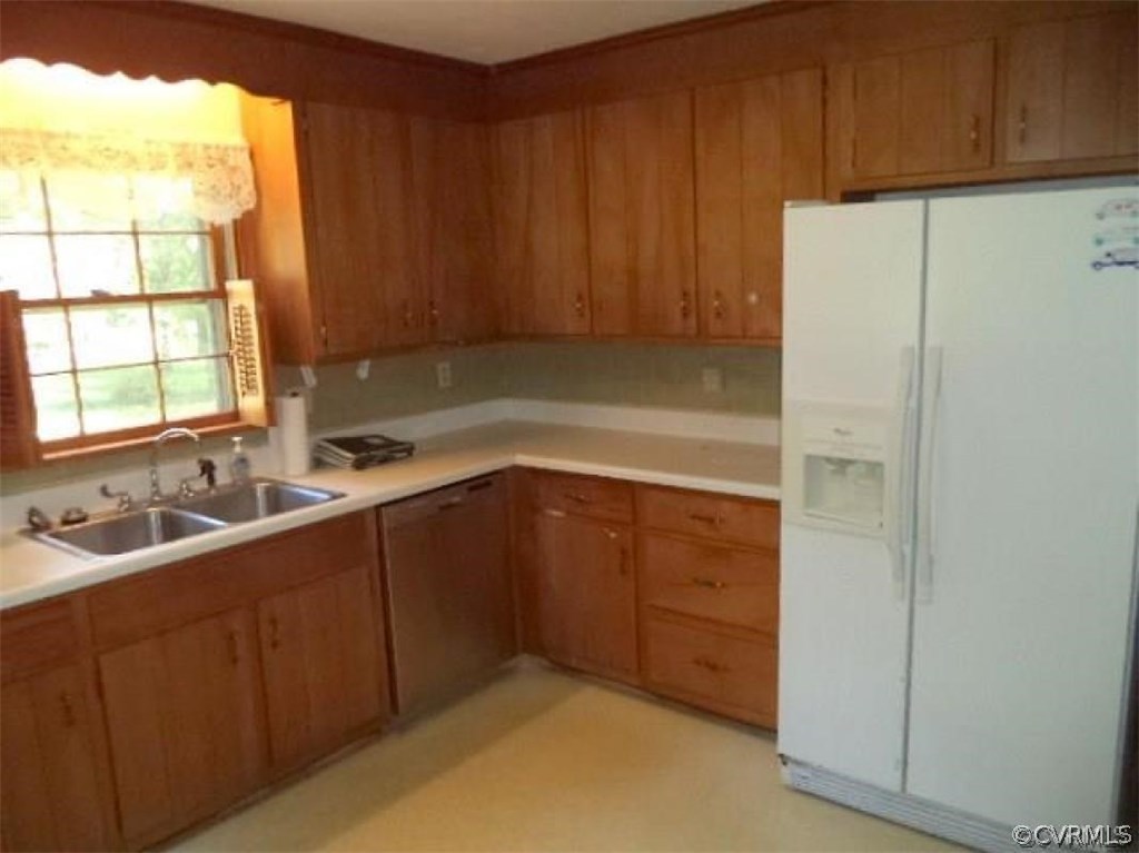 11430 Rochelle Road Chester, VA 23831 - Photo 6 of 21 a kitchen with a sink and cabinets