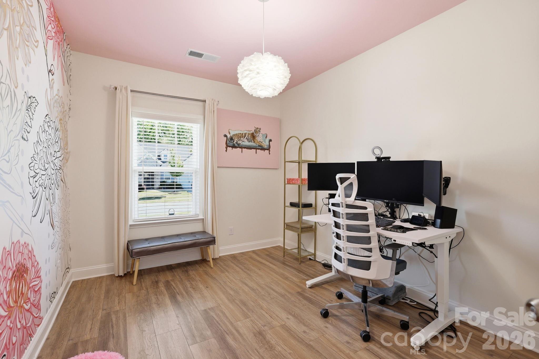 6038 Holland Street Fort Mill, SC 29707 - Photo 26 of 48 a view of a workspace with furniture and a window