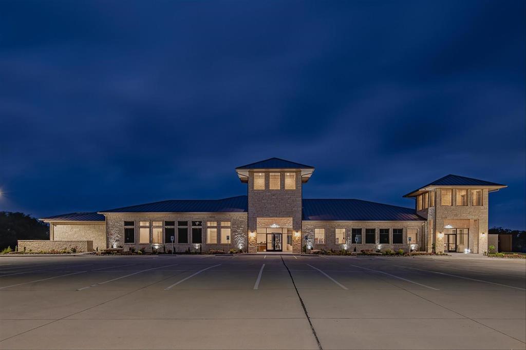 1217 Governors Boulevard Forney, TX 75126 - Photo 18 of 26 a view of a building with many windows