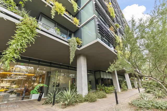 a bedroom with furniture and a bathtub