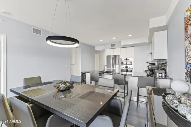 a view of a dining room with furniture