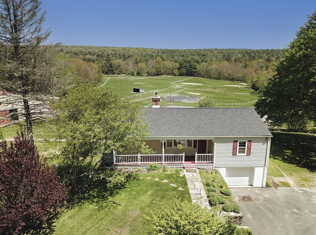 27 Old Poor Farm Road Ware, MA 01082 - Photo 1 of 42 a front view of a house with a yard