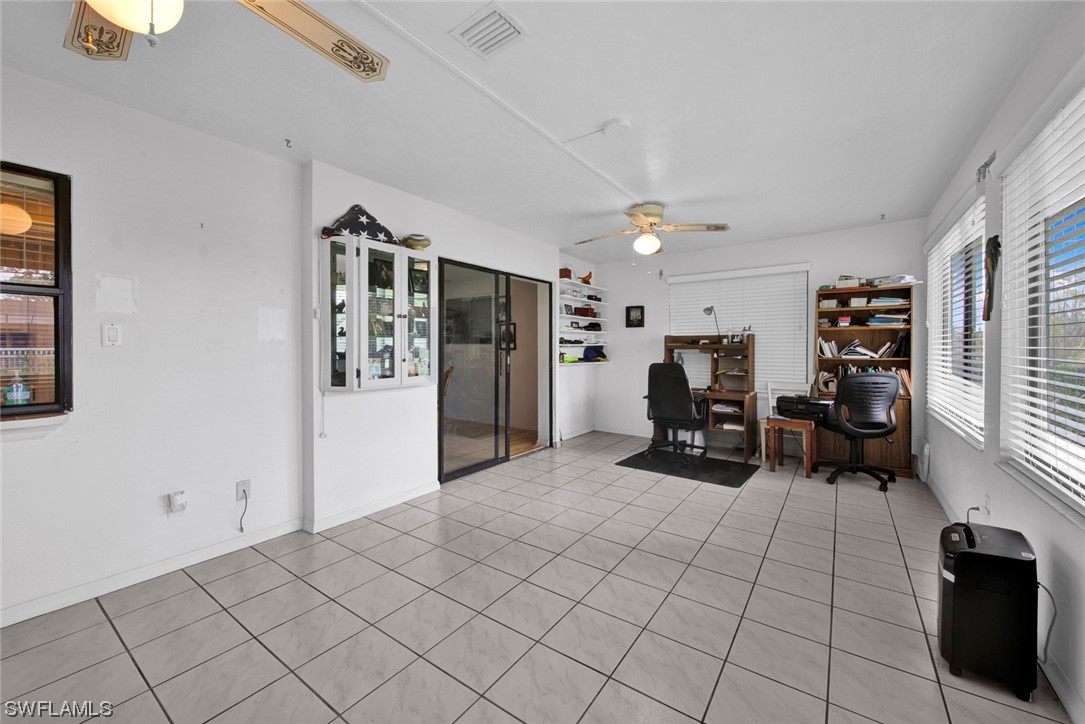7234 Myrtle Road Fort Myers, FL 33967 - Photo 21 of 32 a living room with furniture
