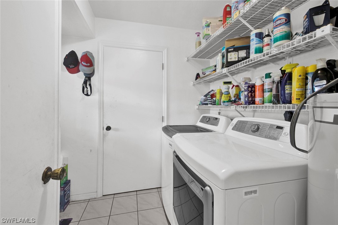 7234 Myrtle Road Fort Myers, FL 33967 - Photo 22 of 32 a utility room with dryer and washer