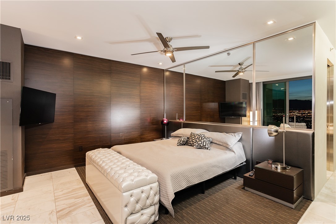 4381 West Flamingo Road, Unit 53321 Las Vegas, NV 89103 - Photo 22 of 41 Bedroom with recessed lighting and light marble finish flooring