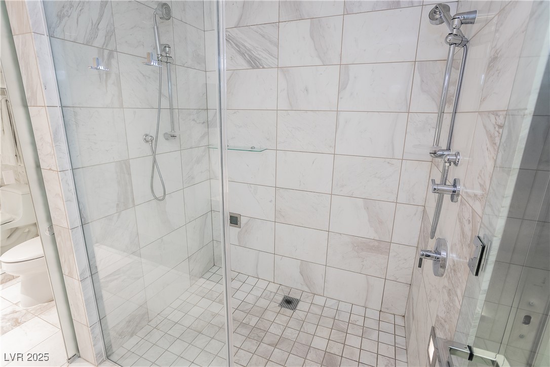 4381 West Flamingo Road, Unit 53321 Las Vegas, NV 89103 - Photo 28 of 41 Bathroom featuring a stall shower