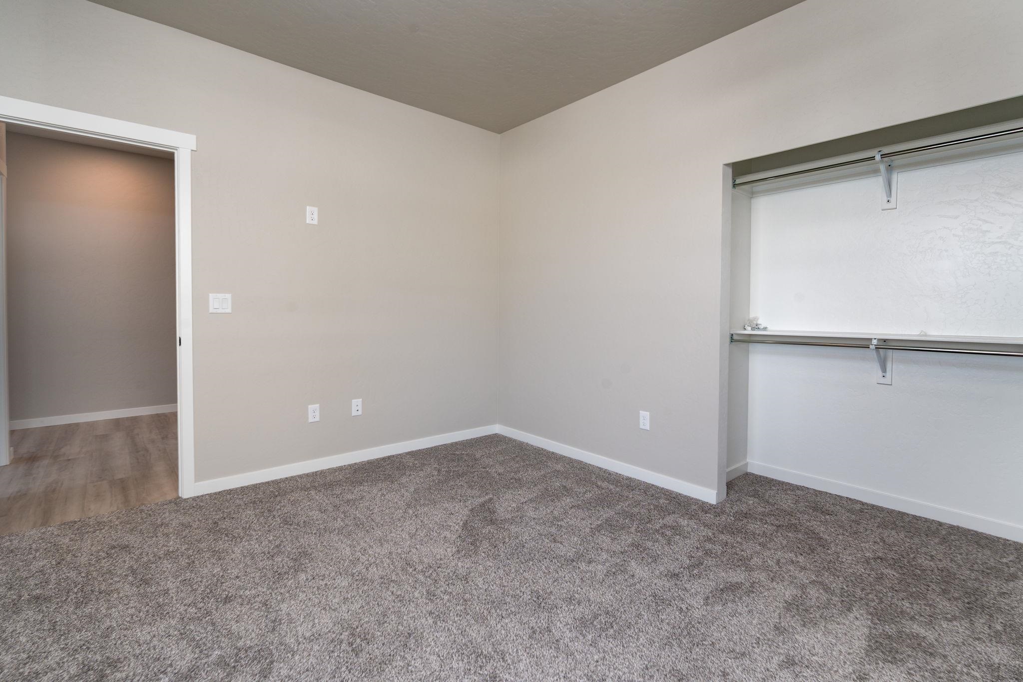 1750 Caliper Way Fruita, CO 81521 - Photo 7 of 19 an empty room with shelves