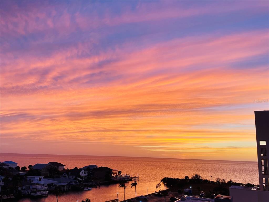 6009 Sea Ranch Drive, Unit 704 Hudson, FL 34667 - Photo 28 of 57 a view of sunset