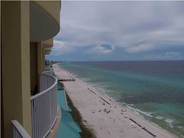 10519 Front Beach Road, Unit 2201 Panama City Beach, FL 32408 - Photo 7 of 10 a view of a dry yard with wooden fence