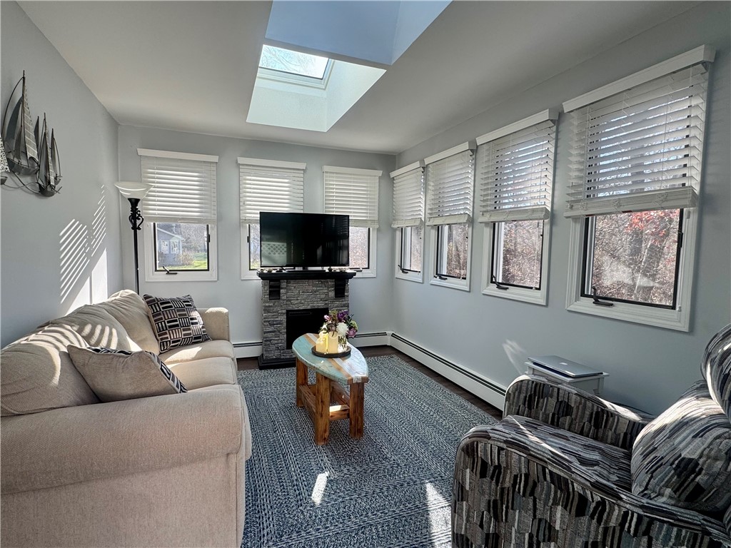 10 Parsley Lane Narragansett, RI 02874 - Photo 13 of 32 Bright and cozy sunroom