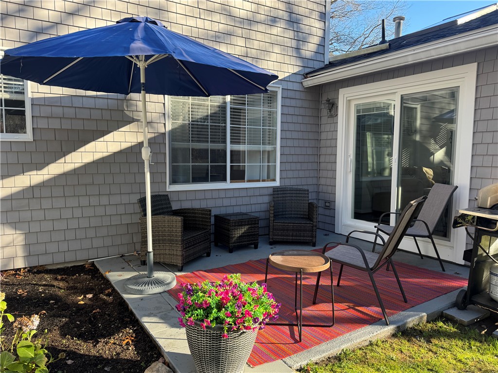 10 Parsley Lane Narragansett, RI 02874 - Photo 29 of 32 Patio with slider doors from the sunroom