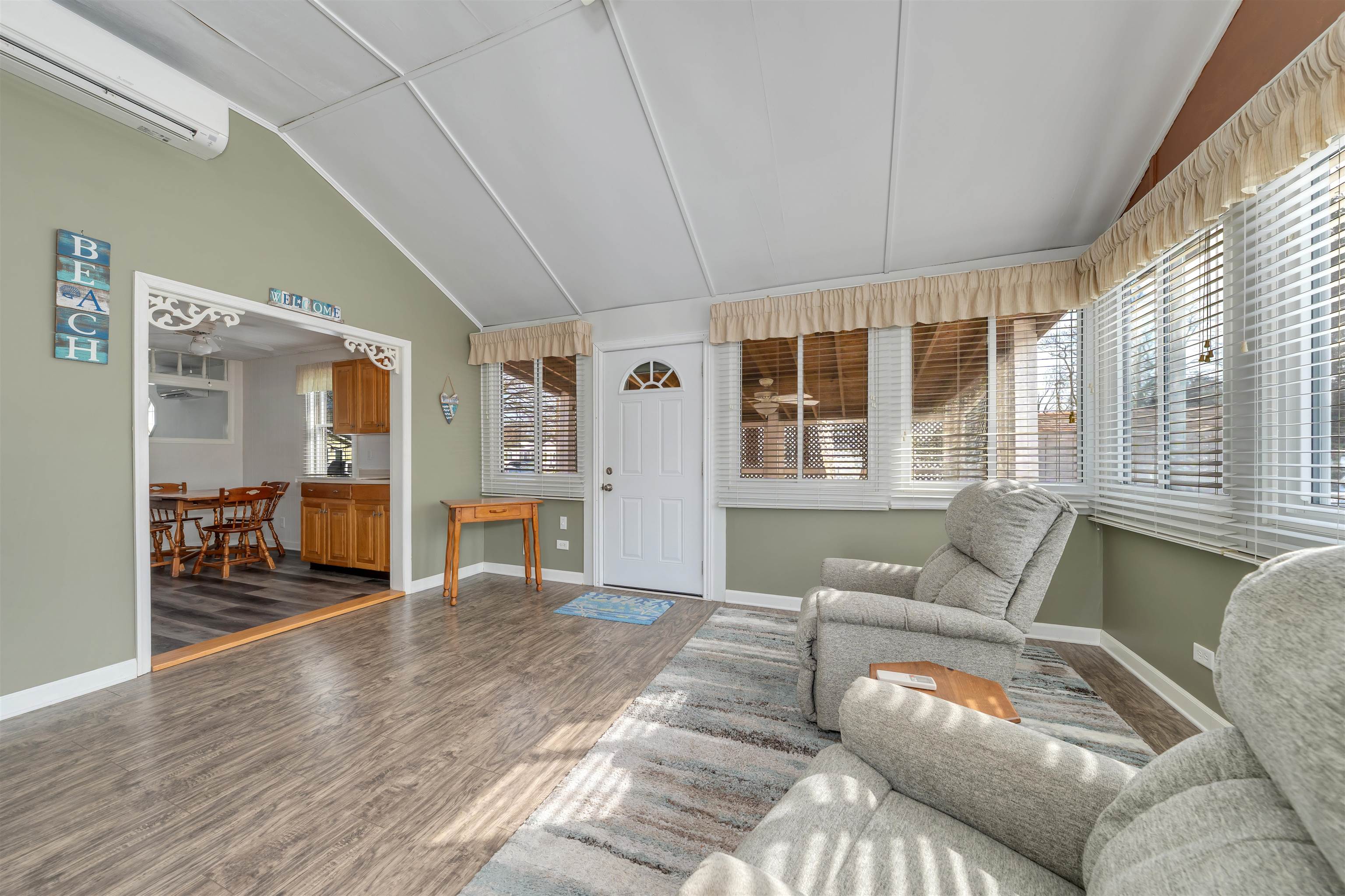 48 Spruce Avenue Villas, NJ 08251 - Photo 14 of 37 a living room with furniture and large windows