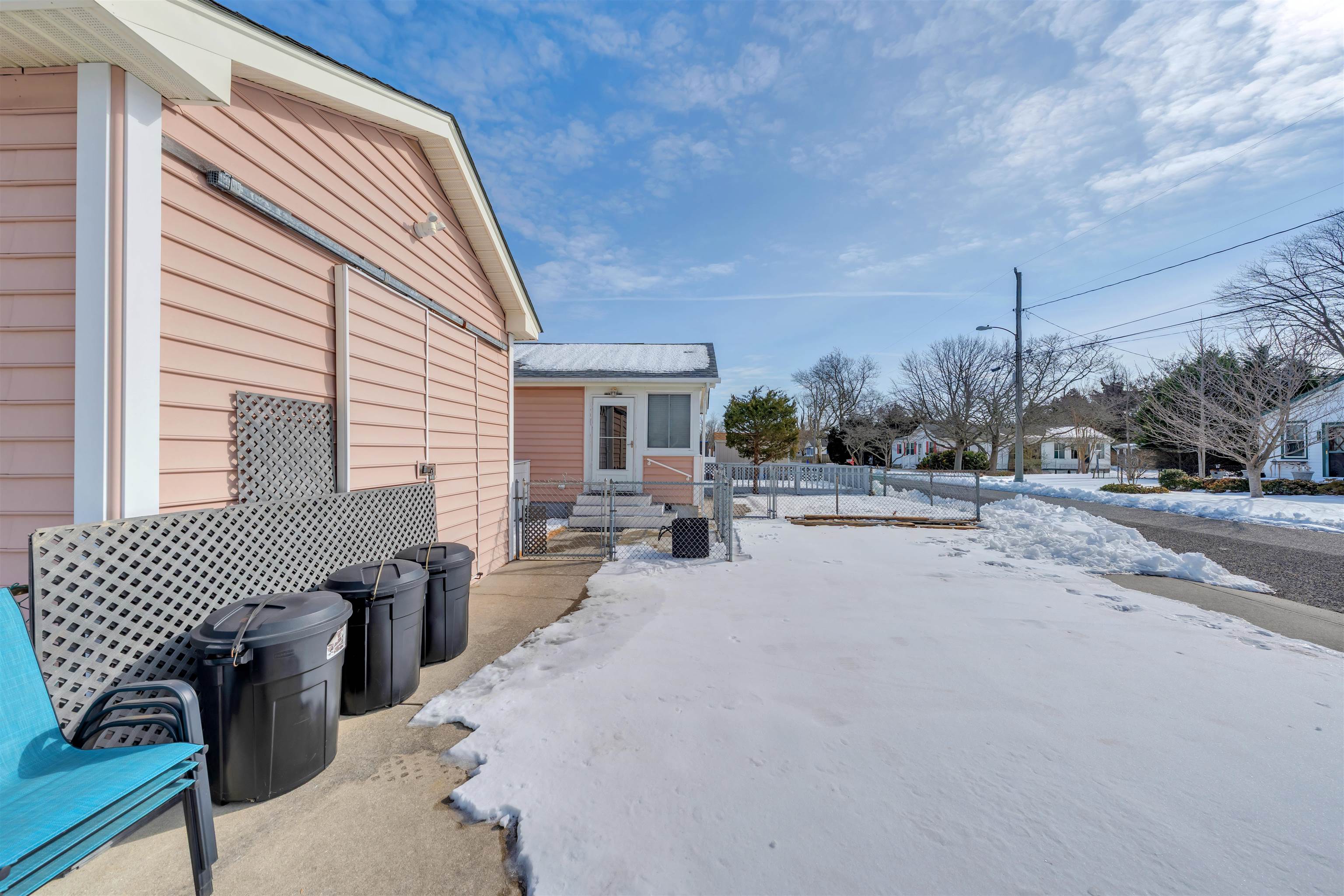 48 Spruce Avenue Villas, NJ 08251 - Photo 28 of 37 a view of a patio with couches and table and chairs