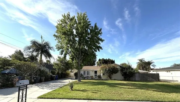 a view of a house with a big yard