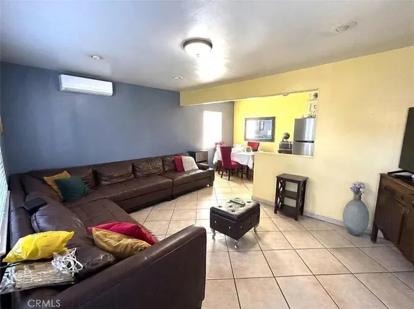 a living room with furniture and a couch