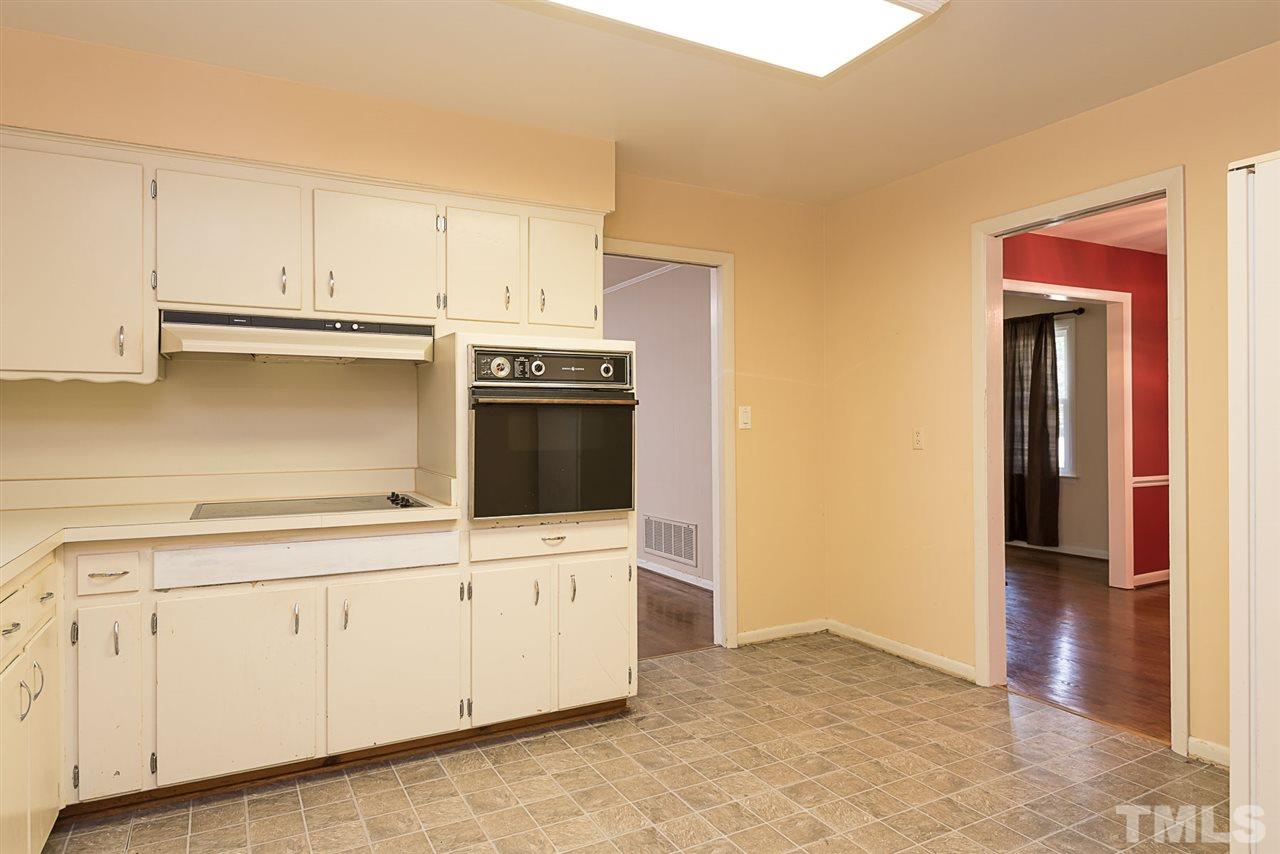 4300 Union Street Raleigh, NC 27609 - Photo 9 of 23 a kitchen with white cabinets and sink
