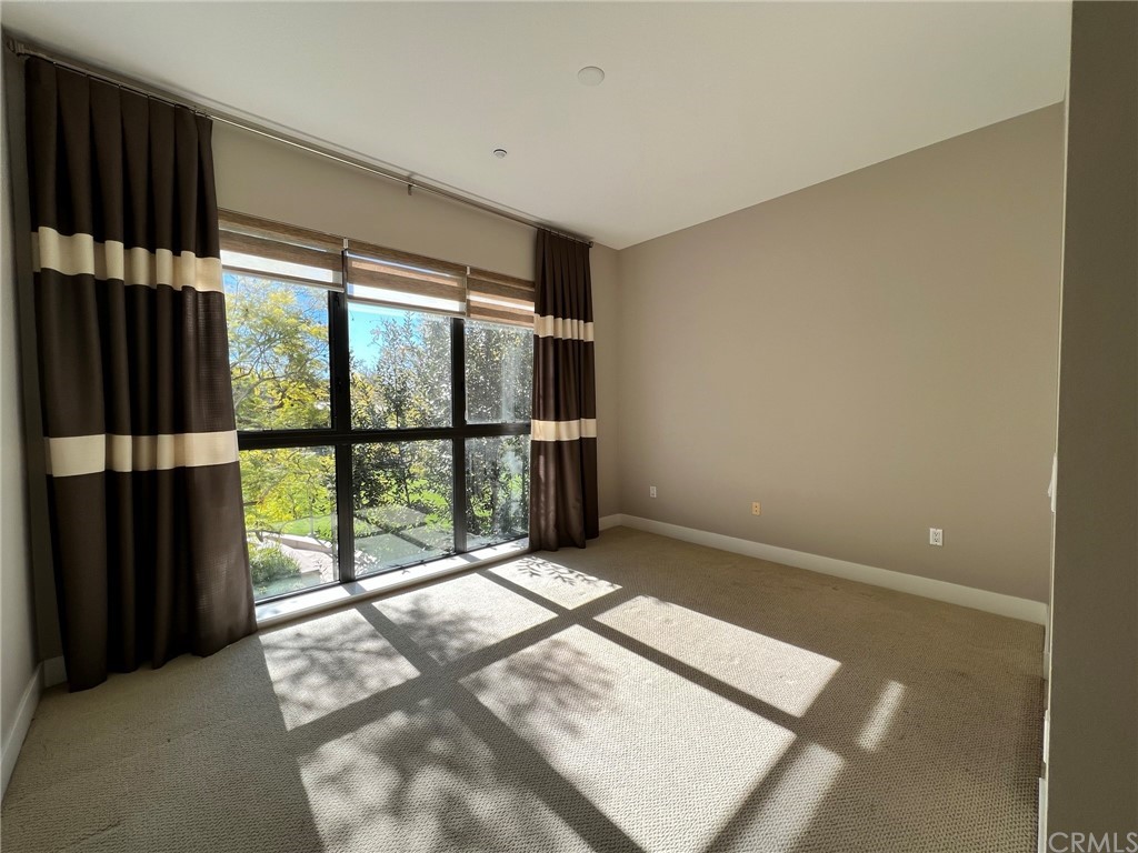 402 Rockefeller, Unit 212 Irvine, CA 92612 - Photo 18 of 27 a view of a big room with windows