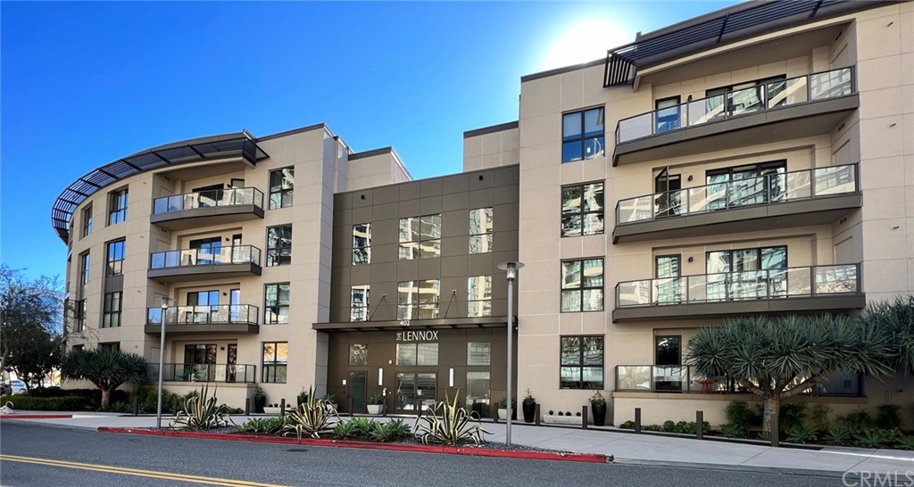 402 Rockefeller, Unit 212 Irvine, CA 92612 - Photo 2 of 27 a front view of multi story residential apartment building