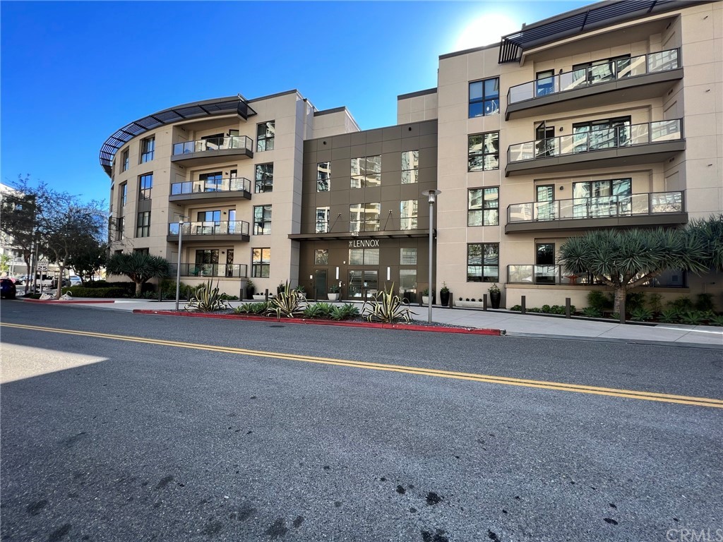 402 Rockefeller, Unit 212 Irvine, CA 92612 - Photo 21 of 27 a city street lined with buildings and trees