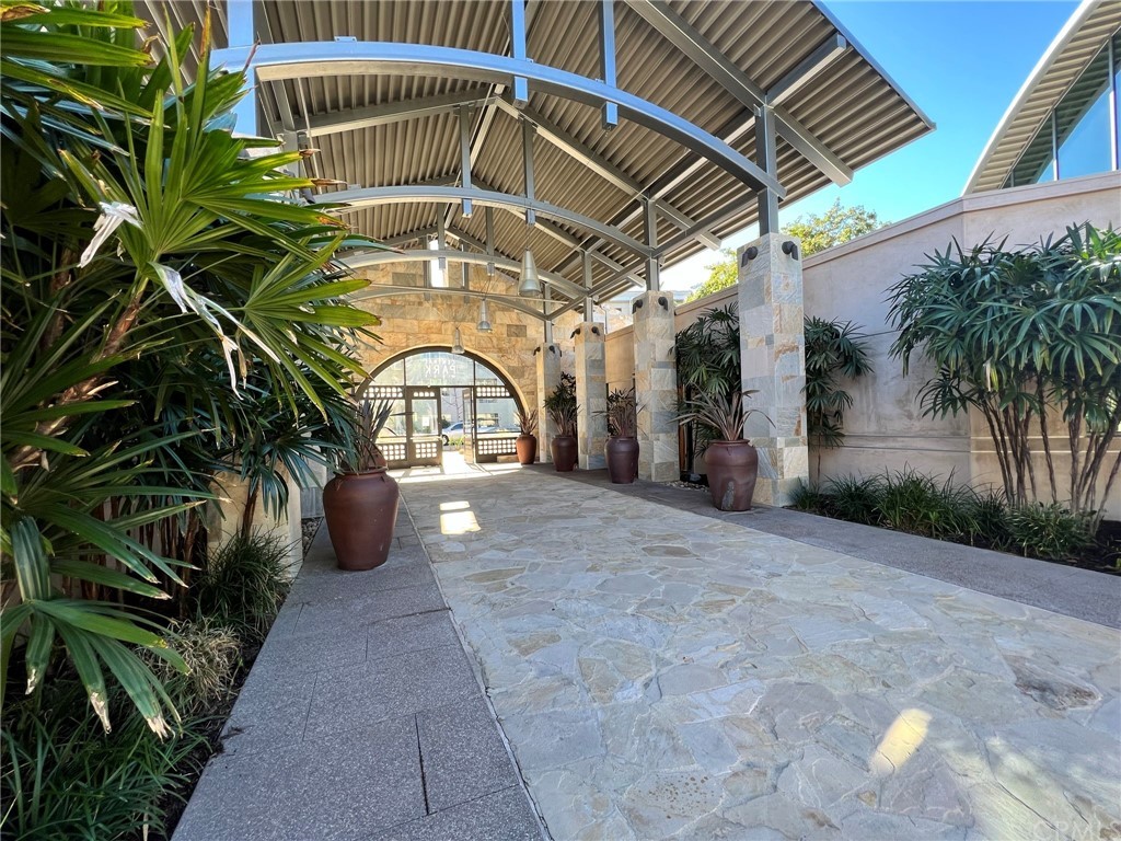 402 Rockefeller, Unit 212 Irvine, CA 92612 - Photo 27 of 27 a view of entryway with a yard