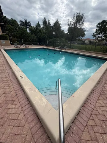 a view of a lake from a balcony
