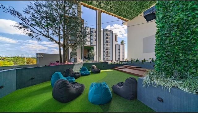 475 Southeast 1st Street, Unit 805A Pompano Beach, FL 33060 - Photo 14 of 19 a view of two chairs in the patio