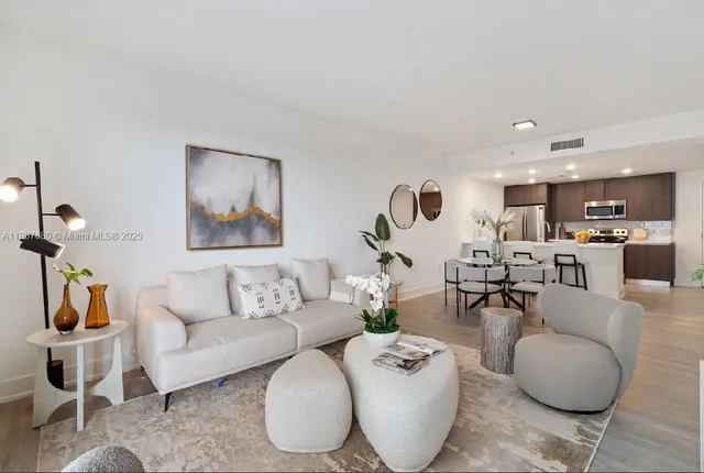 a kitchen with a table and chairs in it