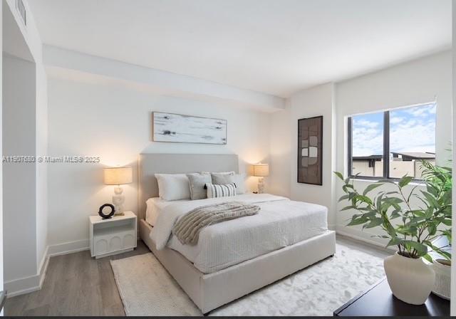 475 Southeast 1st Street, Unit 805A Pompano Beach, FL 33060 - Photo 7 of 19 a bedroom with a bed and a couch