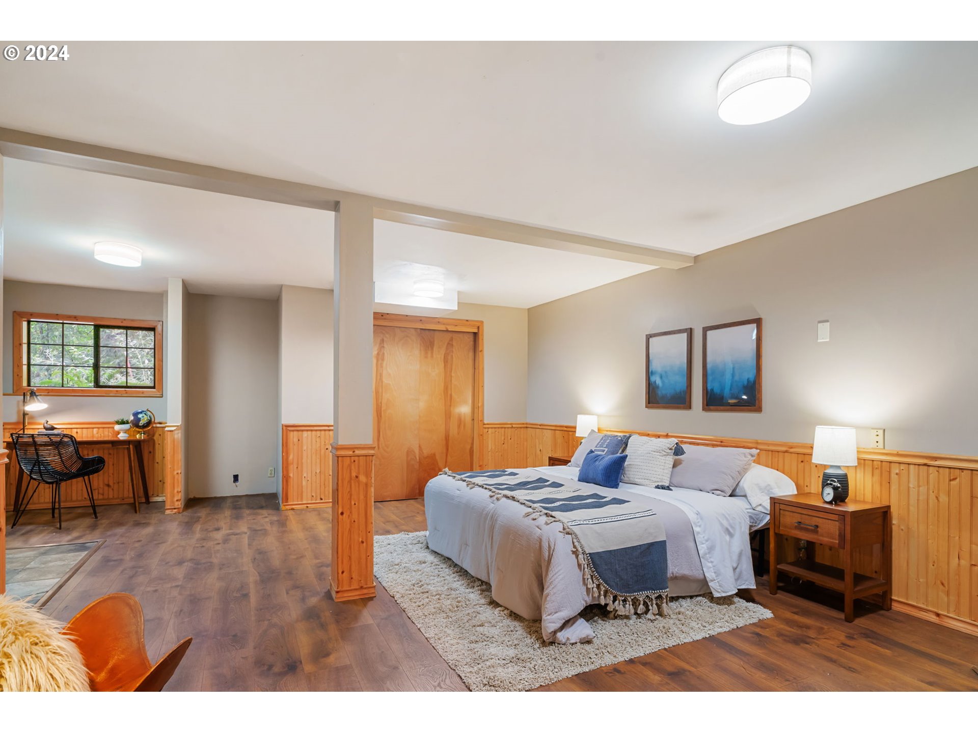 24271 South Newkirchner Road Oregon City, OR 97045 - Photo 23 of 41 a bedroom with a bed and wooden floor