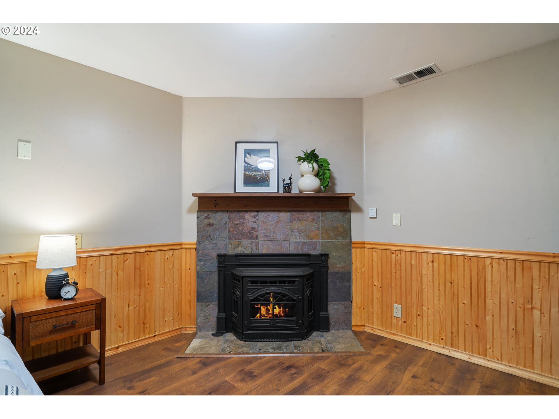 24271 South Newkirchner Road Oregon City, OR 97045 - Photo 24 of 41 a living room with furniture and a fireplace